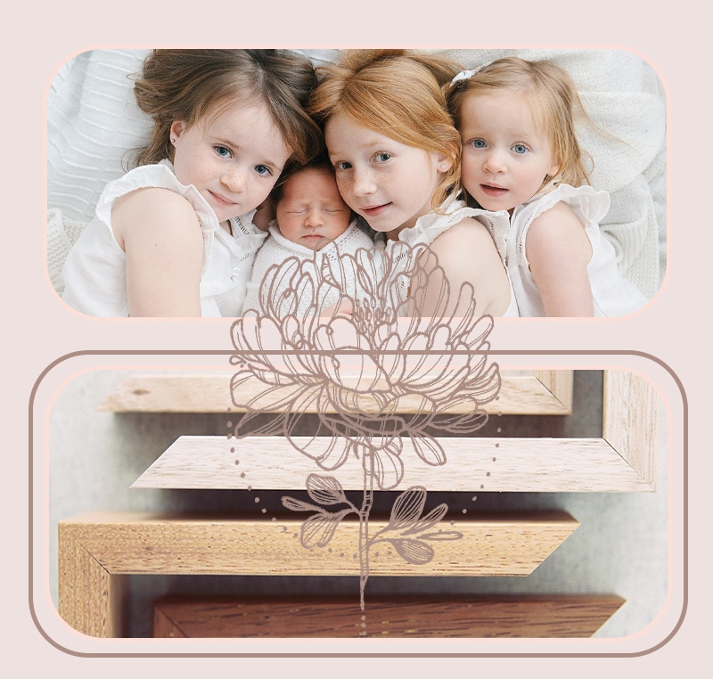 Three sisters hugging newborn brother and frame samples