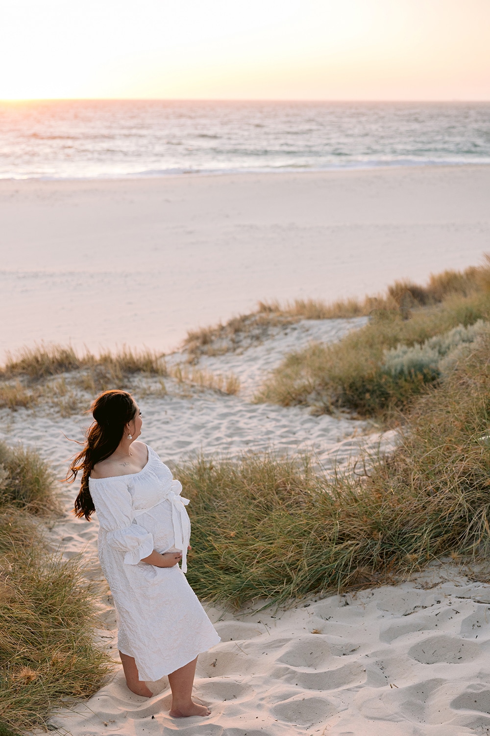 Pregnant woman at the beach