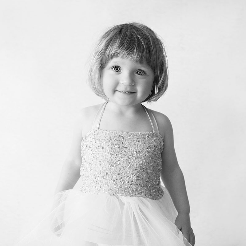 A girl wearing her party dress