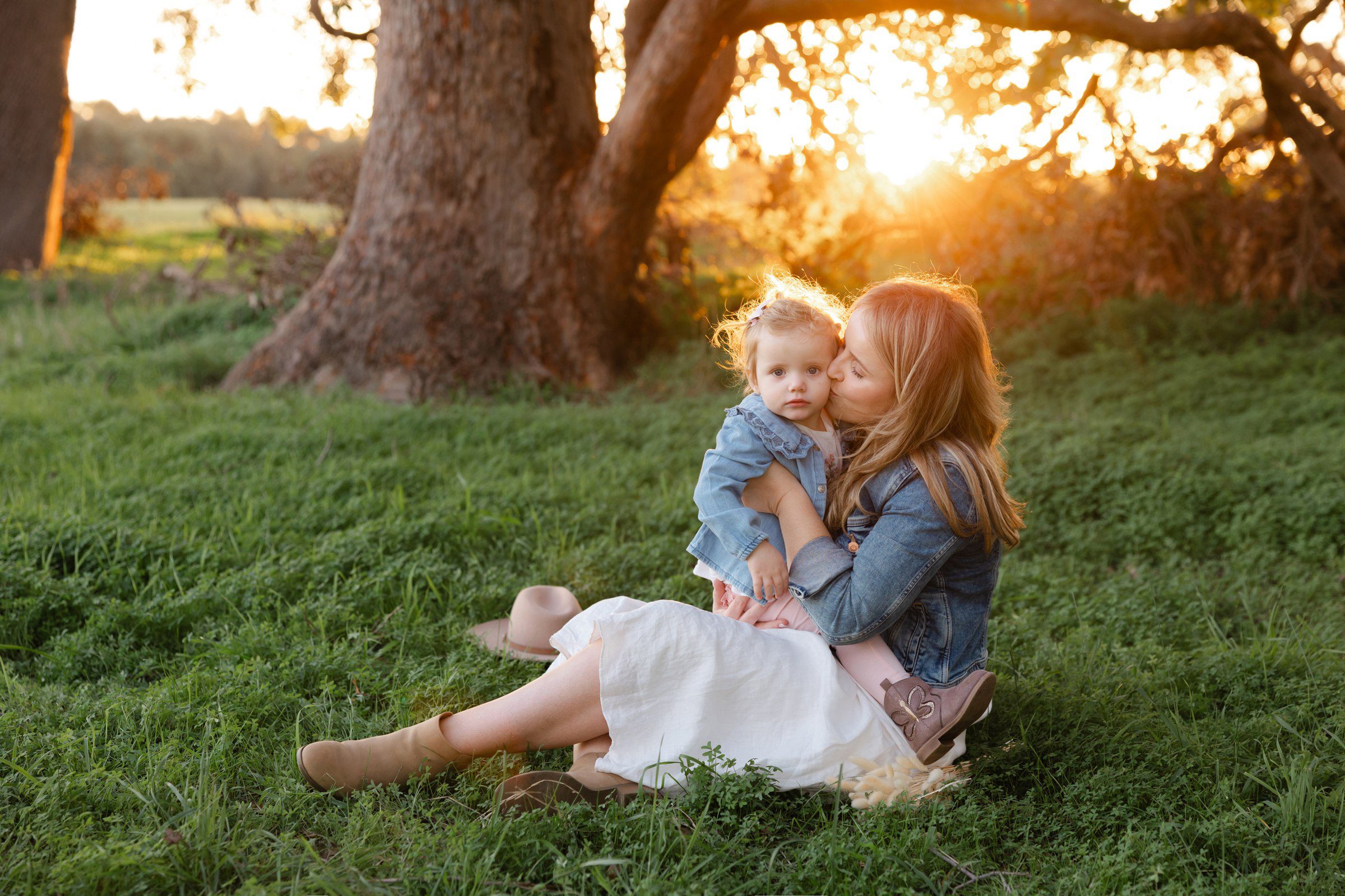 Authentic family connection captured during golden hour session by Perth family photographer