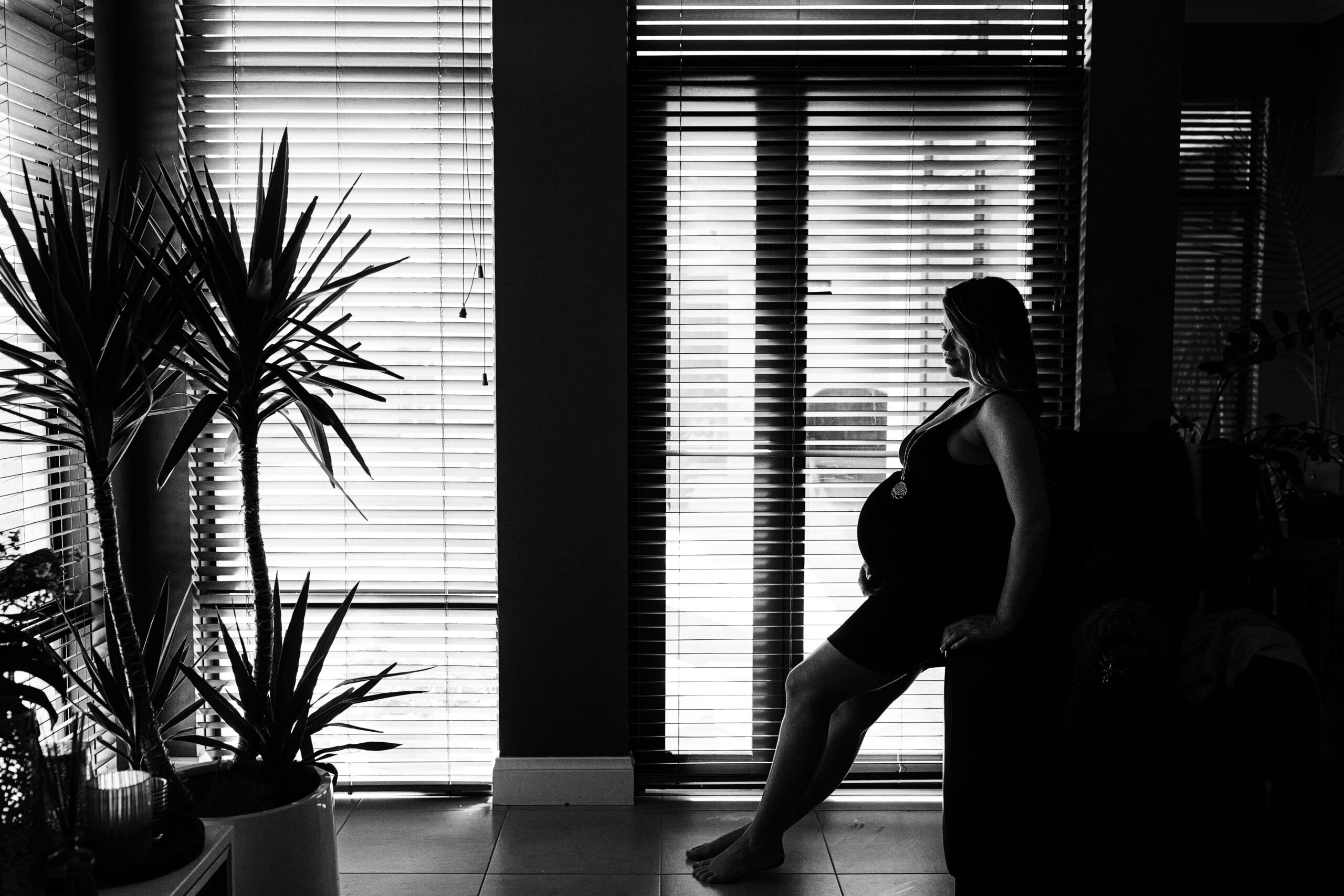 At-home maternity photography Perth, intimate home portrait.